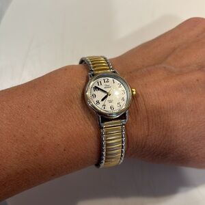 Timex Water Resistant Silver & Gold wristband watch.  Needs battery.